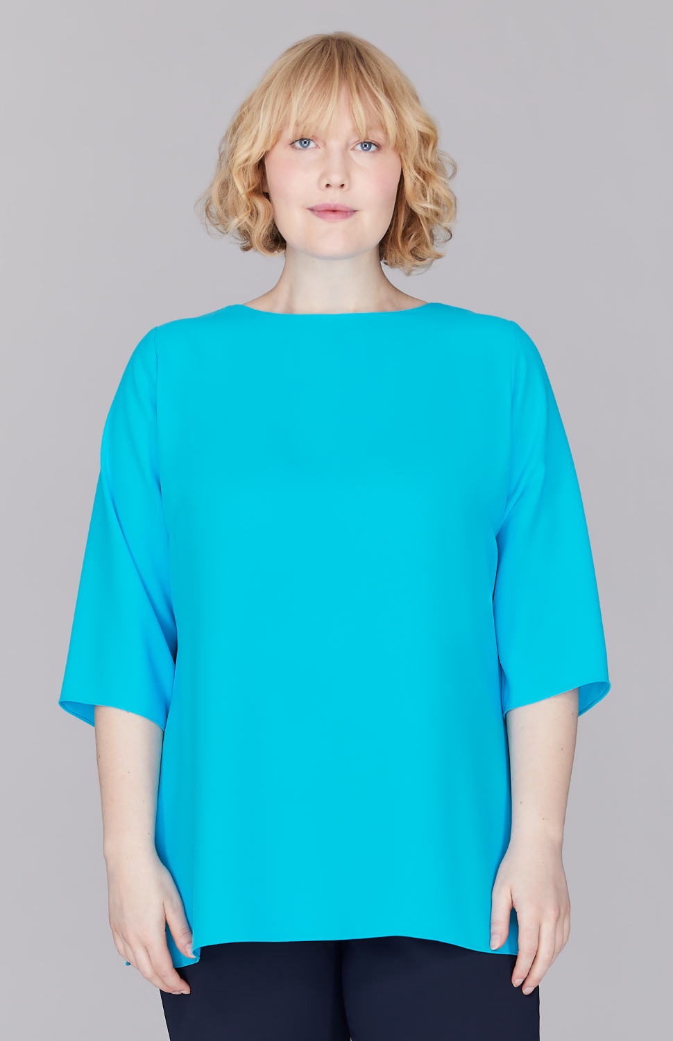 Molly is 5'9" and is wearing a size L in Turquoise.