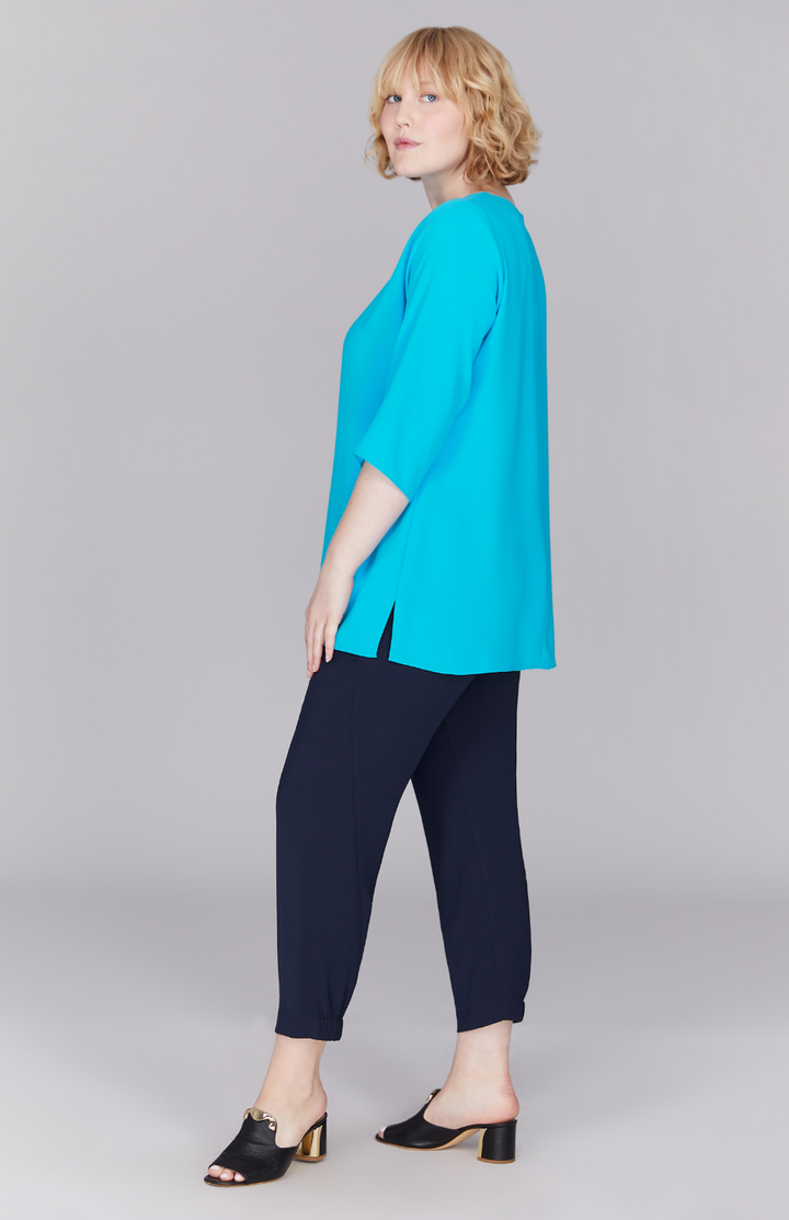 Molly is 5'9" and is wearing a size L in Turquoise.