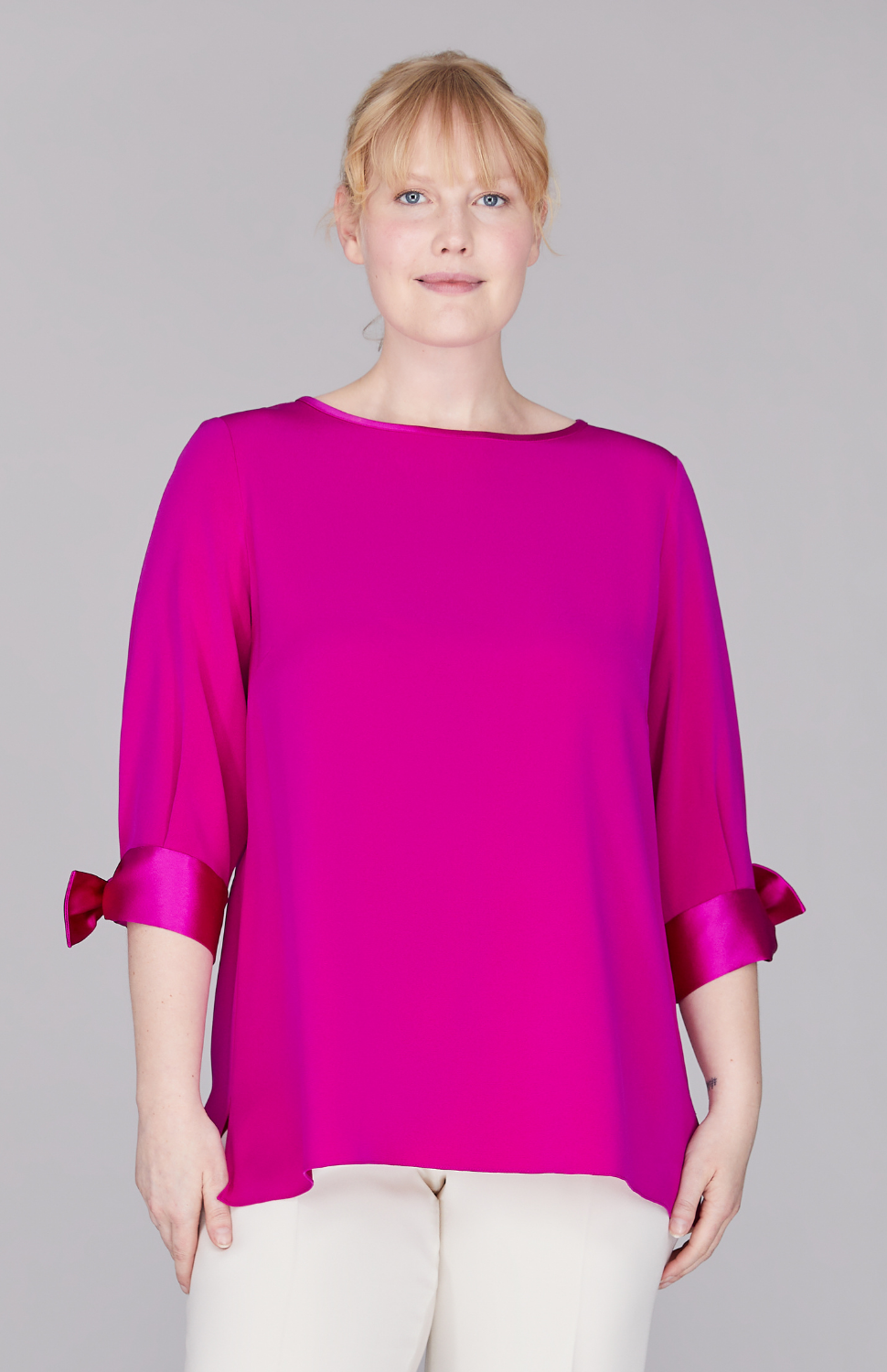 Molly is wearing Fuchsia in size L