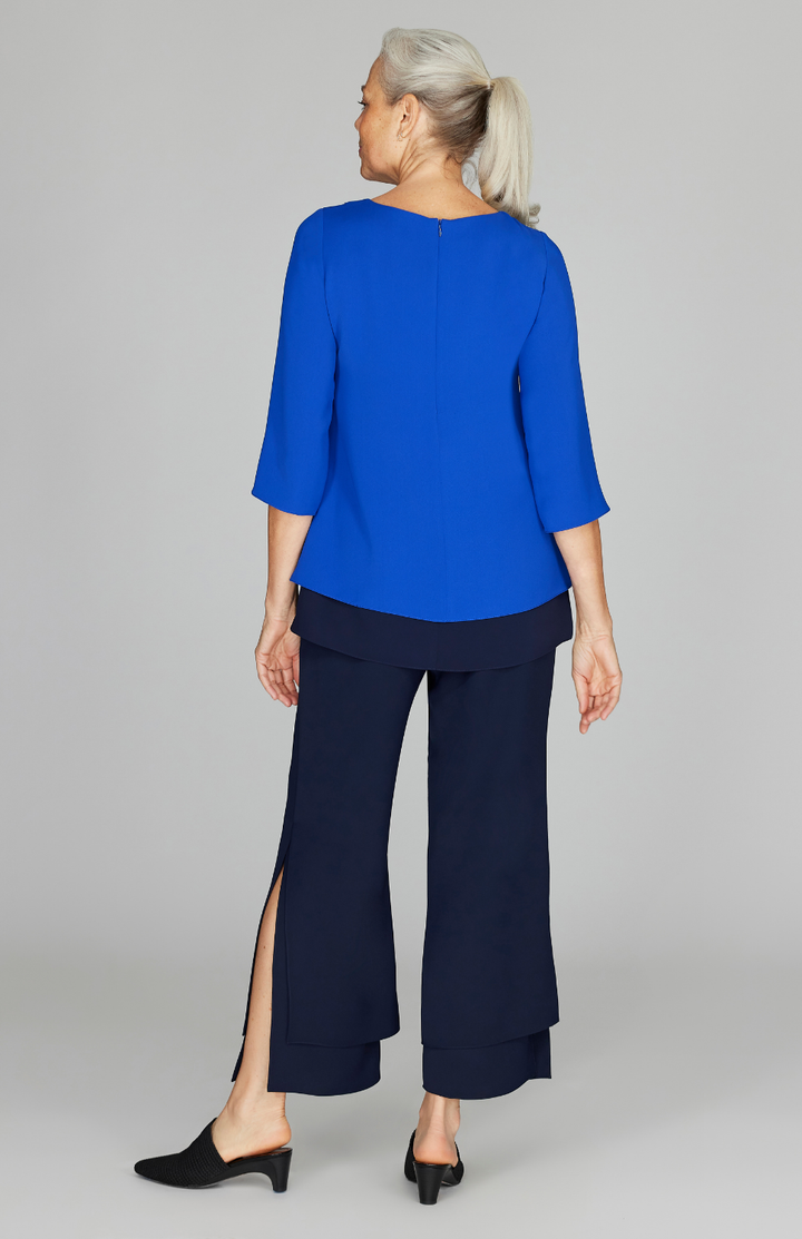 Fabienne is wearing Cobalt Midnight Combo in size XS.