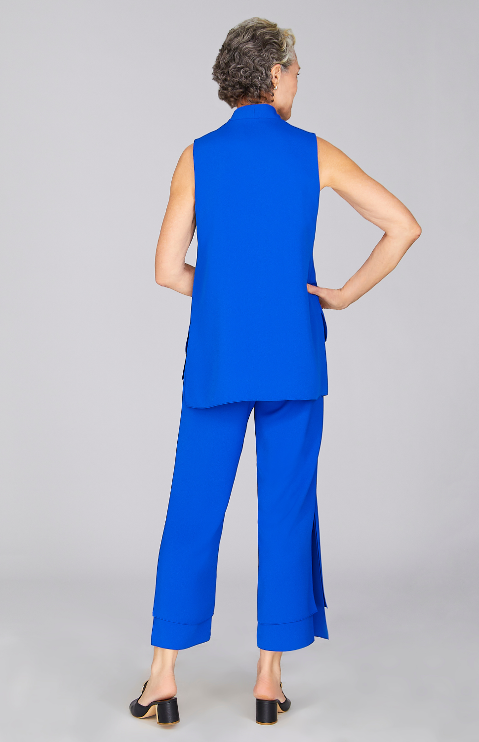 Nancy is wearing Cobalt in size XS.