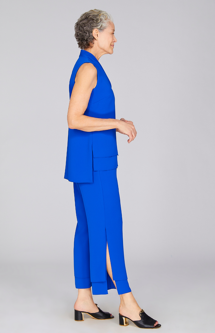 Nancy is wearing Cobalt in size XS.