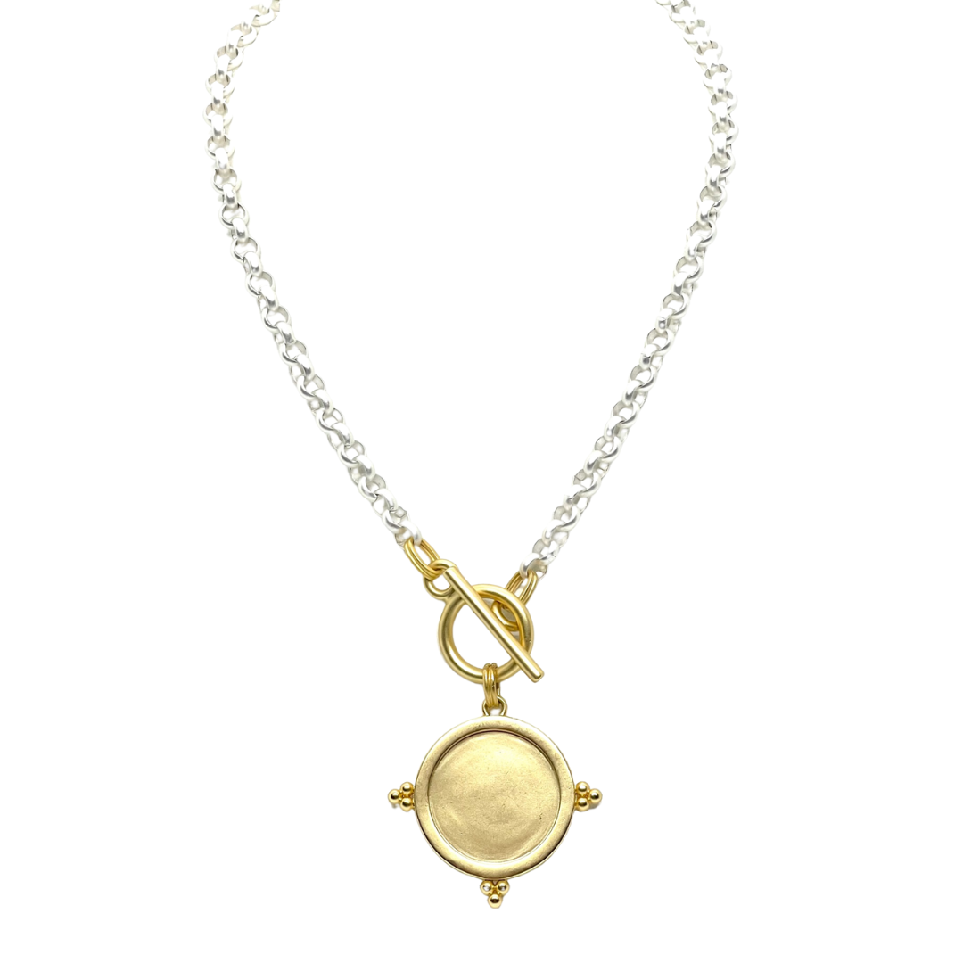 Matte Gold Starburst Pendant on Matte Silver Chain Necklace